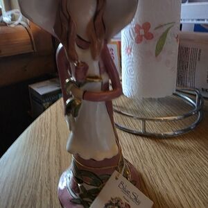 Blue Sky Pink and White Figurine